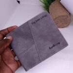 Engraved processed leather wallet