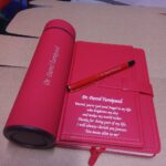 Customisedbrandedengraved notebook, pen flask