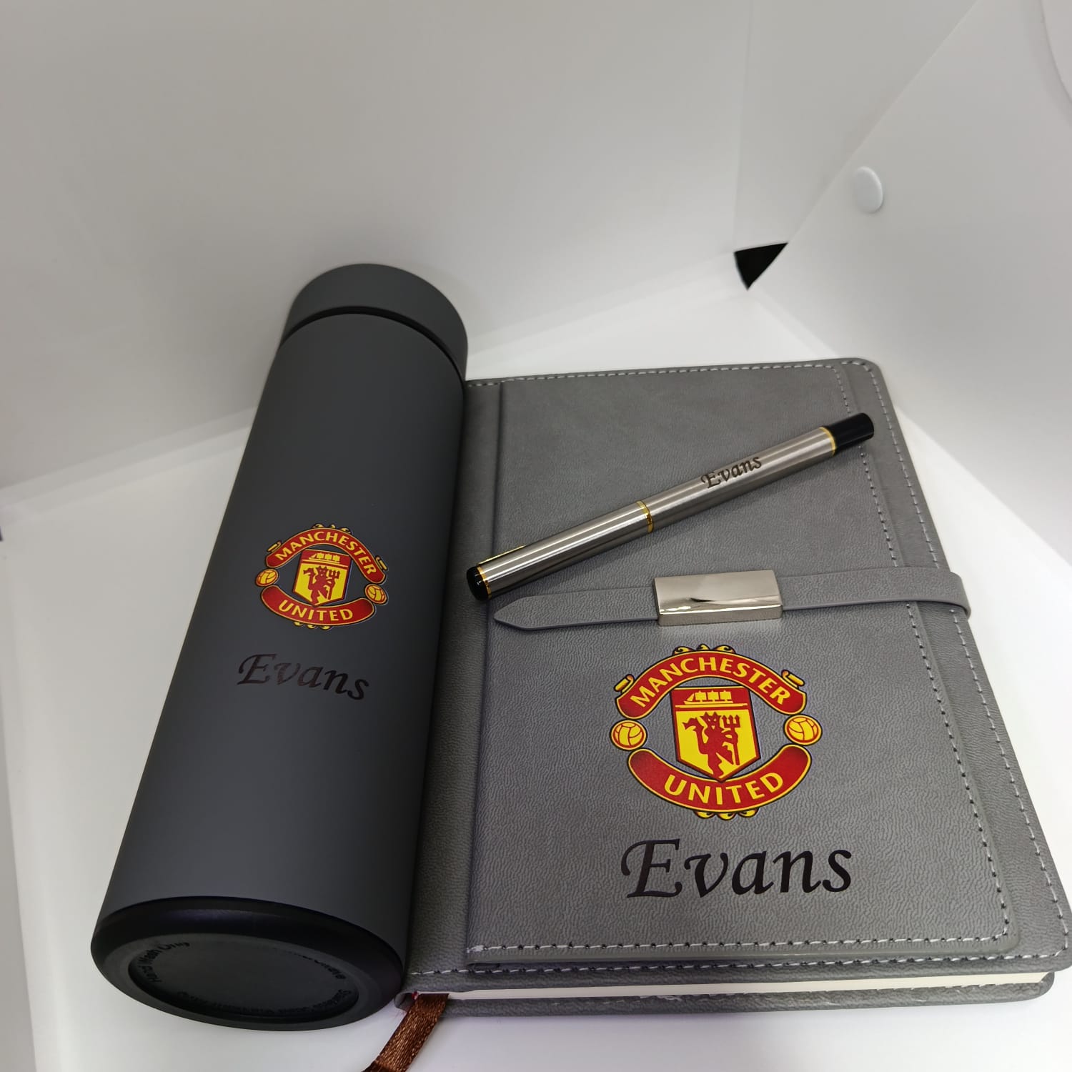 WhatsApp Image 2026-07-27 at 21.24.12 (2) Personalized Manchester United Gift Set | Custom Flask, Notebook & Pen Gift - Image 1