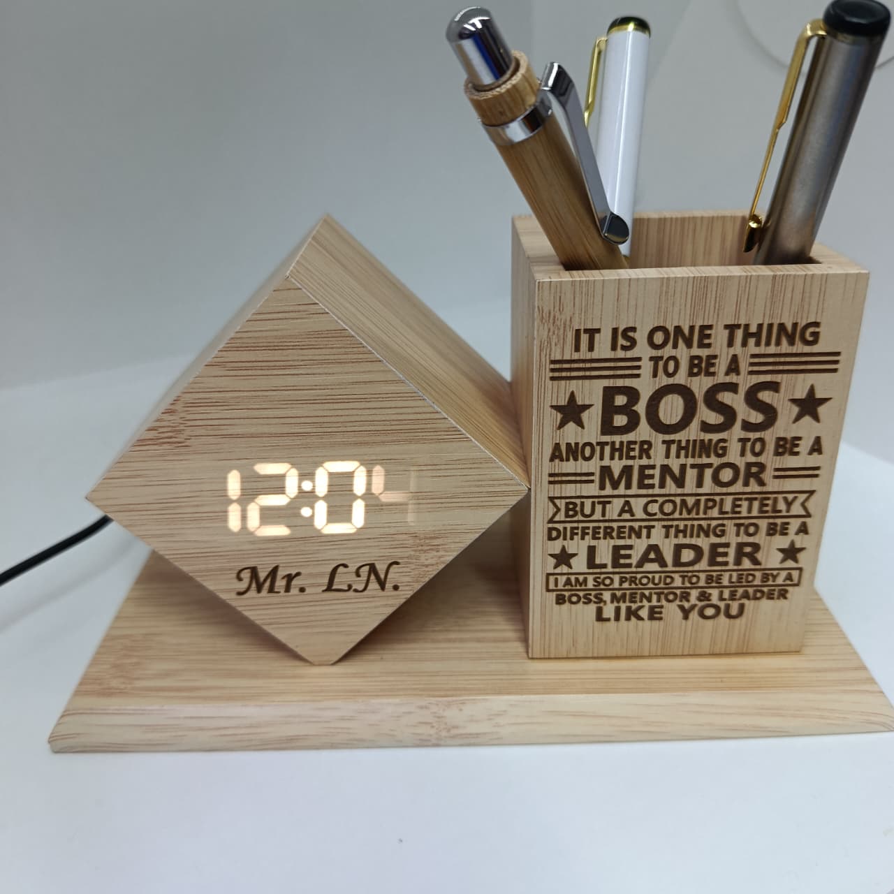 WhatsApp Image 2026-07-28 at 15.20.07 (1) Personalized Wooden LED Clock Pen Holder Personalized Wooden LED Clock Pen Holder with custom engraving. A stylish bamboo desk organizer featuring a digital clock and pen holder for office gifts. - Image 1