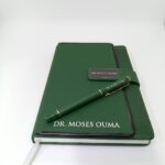 engraved green leather notebook