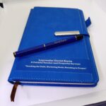 personalized notebook with branded pen
